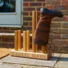 Engraved wooden welly boot stand