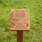 Deep engraved wooden grave marker